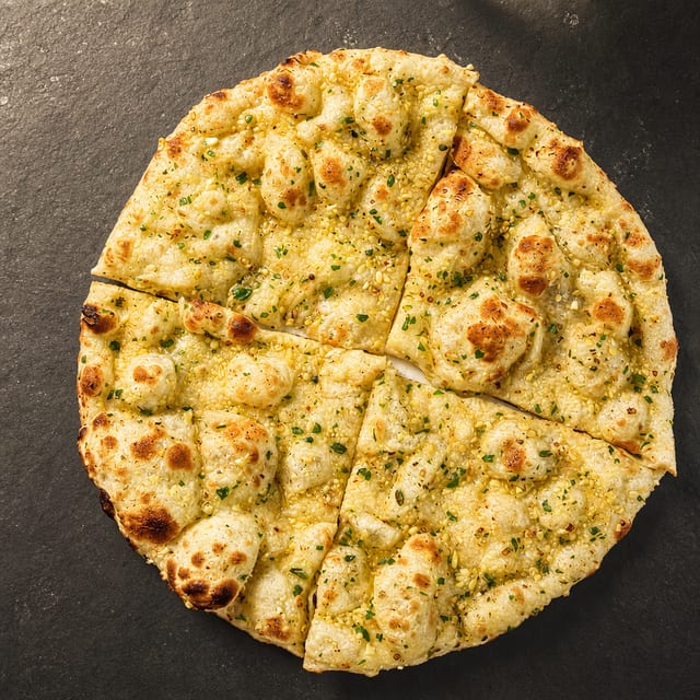 Chili Garlic Naan (1 Piece).