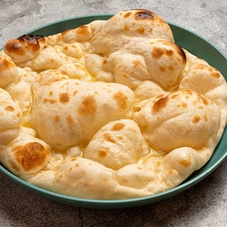 Butter Naan ( 1 Piece)